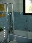 HSK Badewannenaufsatz "Exklusiv", mit feststehendem kurzen Seitenteil und Pendeltür, Profile silber-matt, Echtglas klar-hell 6 mm, Höhe 1400 mm, Länge 1000 mm